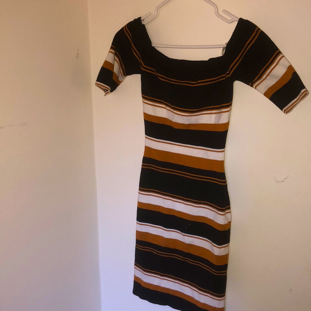 Beautiful dress/ with black, brown and white stripes /size M.